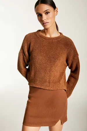 RIBBED ASYMMETRICAL SLIT MINI SKIRT