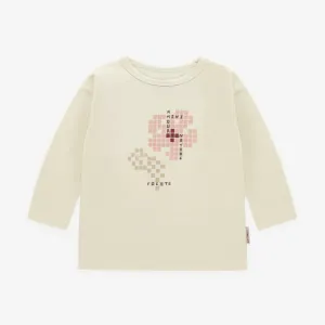 T-shirt manches longues crème avec illustration de fleur pixellisée en jersey, bébé || Cream long sleeve t-shirt with pixelated flower illustration in jersey, baby