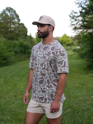 The Marsh Green Camo Migrator Performance Tee